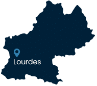 Marqueur de localisation bleu sur fond nuit indiquant le texte 'Lourdes'. Symbole cartographique de la ville de Lourdes.